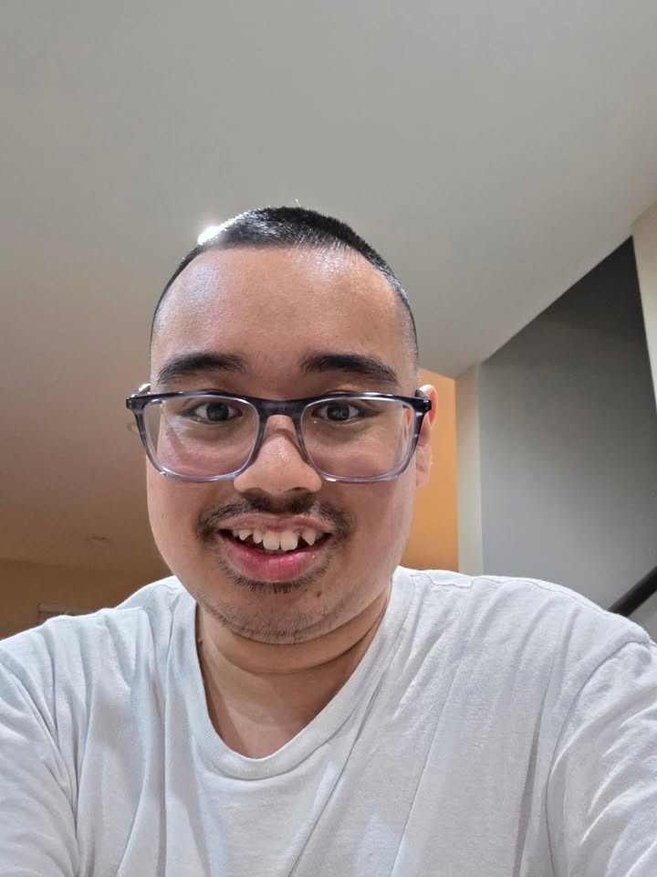 Yuan smiling