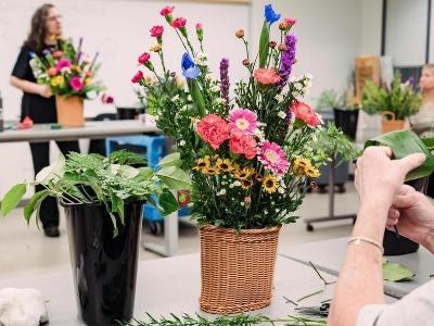 Students working with flowers
