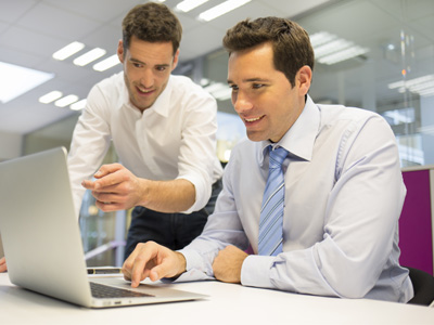 adult male students at computer