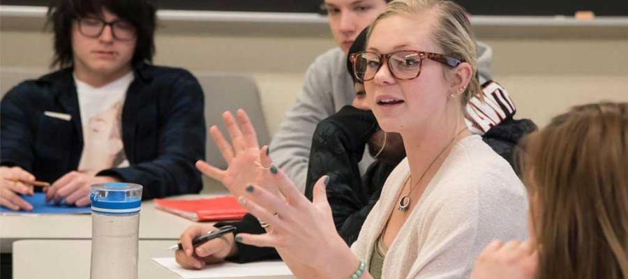 Female student in class discussion