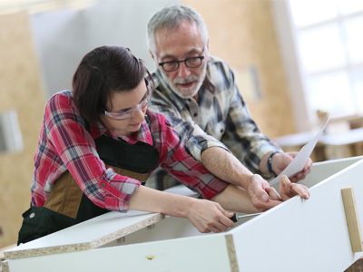 adult students in woodworking class